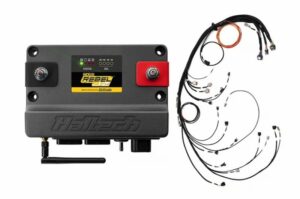 Haltech Nexus Rebel ECU (engine control unit) with a full wiring harness laid out to the right for installation.